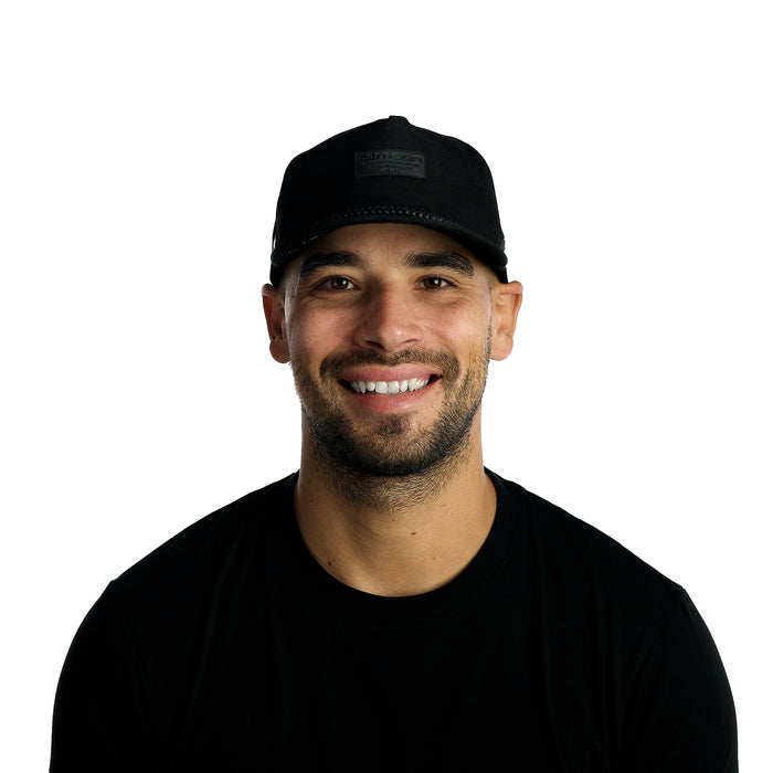 The model-image of the Melin Split Fit Coronado Brick Thermal hat in Black