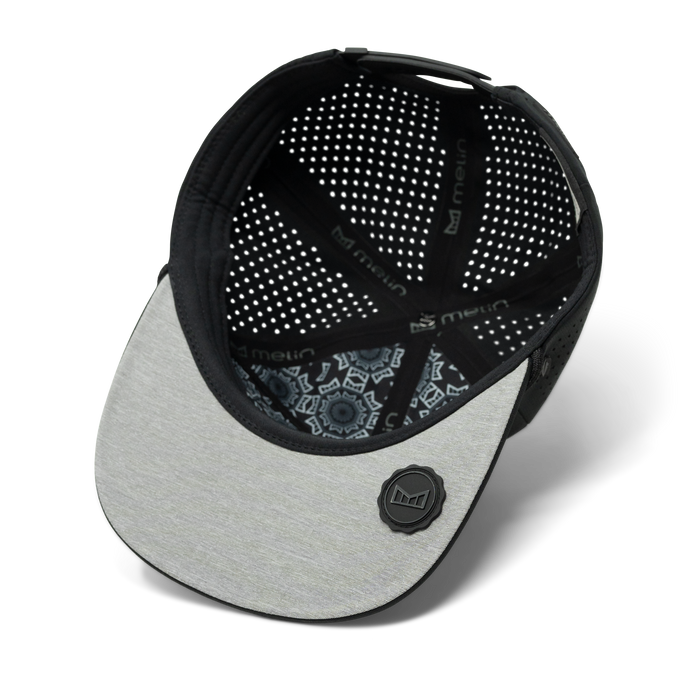 The inside view of melin's Coronado Hydrolite snapback hat in Black