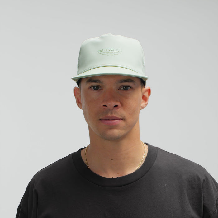 The model-image of the melin Split Crushed Fit Coronado Hydrolite hat in dusty mint