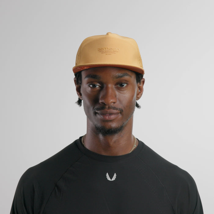 The model-image of the melin Split Crushed Fit Coronado Hydrolite hat in burnt bronze