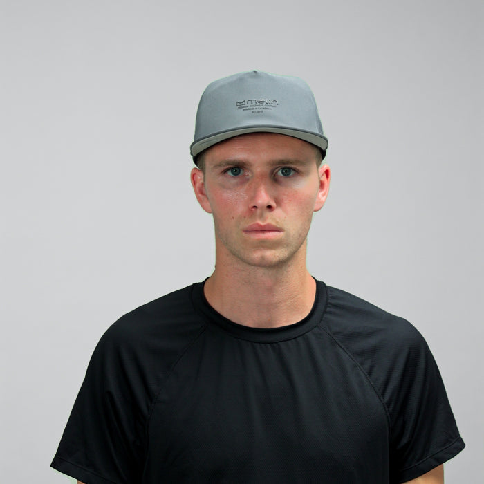 The model-image view of the melin Split Fit Coronado Hydrolite hat in Stormy Blue