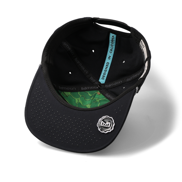 The inside view of the melin Split Crushed Fit Coronado Links Hydro hat in black