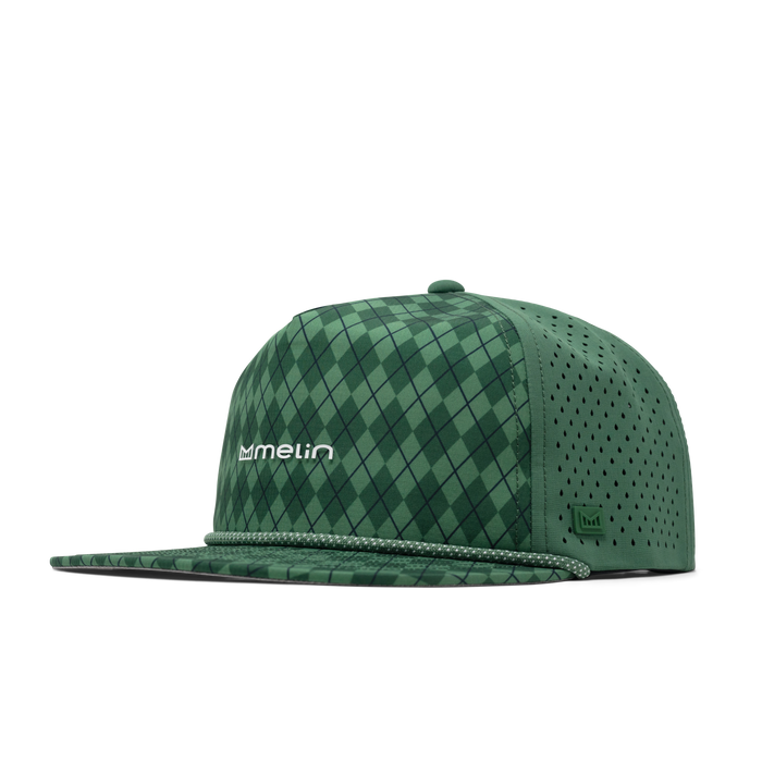 The front, angled view of the melin Coronado Links Hydro  Split Crushed Fit in  Green Argyle