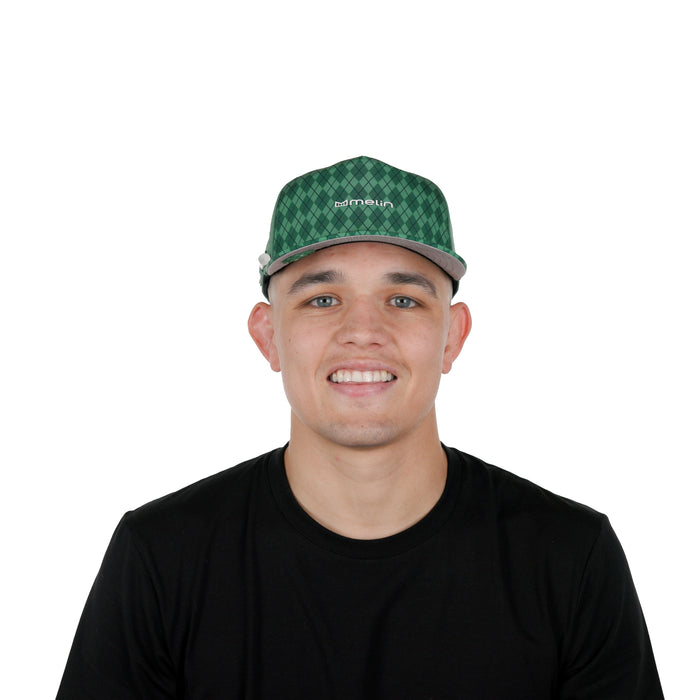 The model-image of the Melin Split Crushed Fit Coronado Links Hydro hat in Green Argyle