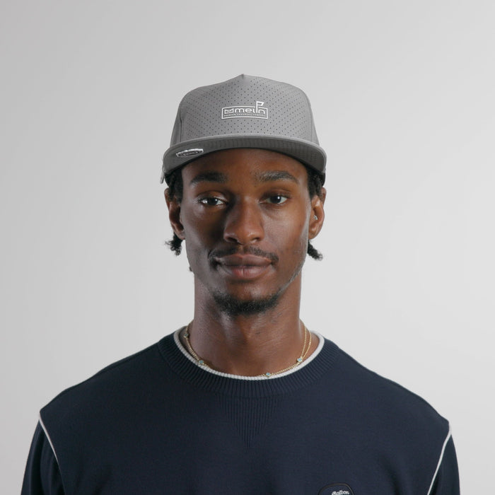 The model-image of the melin Split Crushed Fit Coronado Links Hydro hat in grey