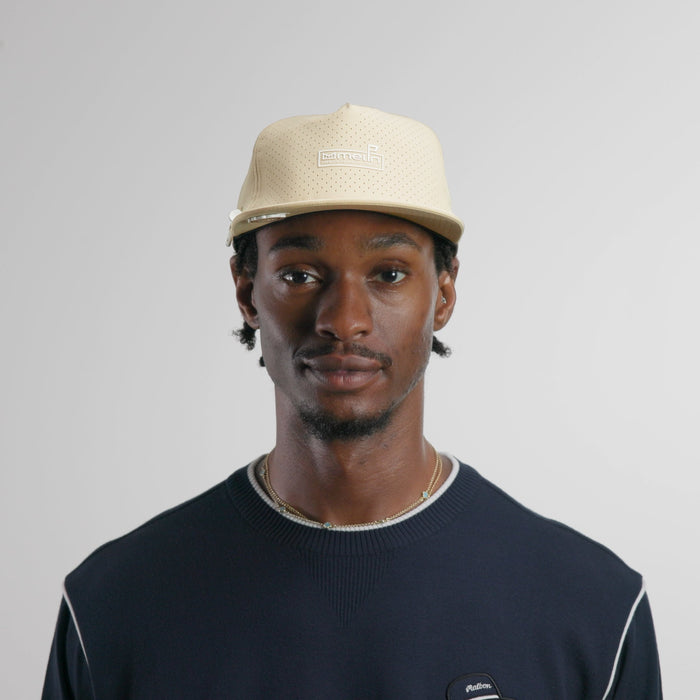 The model-image of the melin Split Crushed Fit Coronado Links Hydro hat in khaki