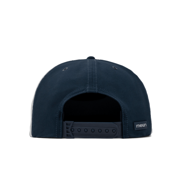 The back view of the melin Coronado Links Drive Hydro  Split Crushed Fit in  Navy / White