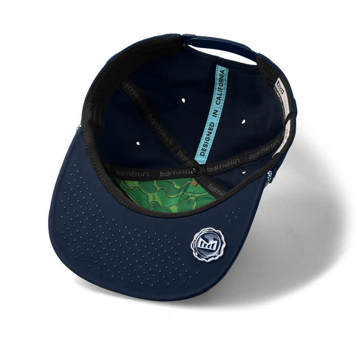 The inside view of the melin Split Crushed Fit Coronado Links Hydro hat in navy