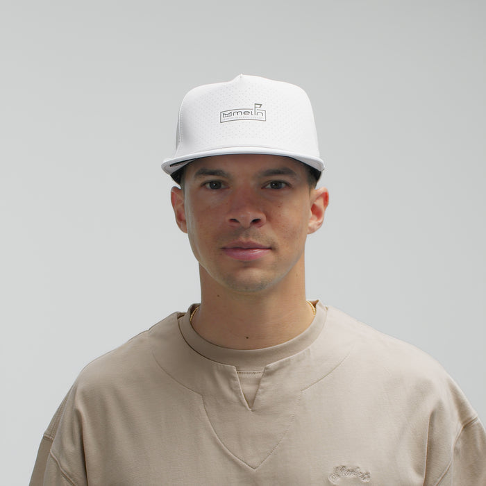 The model-image of the melin Split Crushed Fit Coronado Links Hydro hat in white