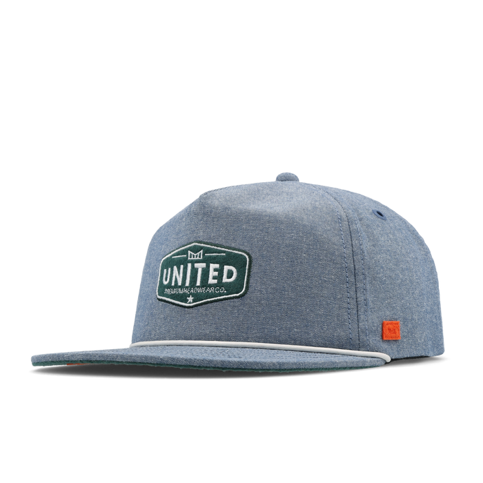 The front, angled view of the melin Coronado Mill United  Split Crushed Fit in  Chambray