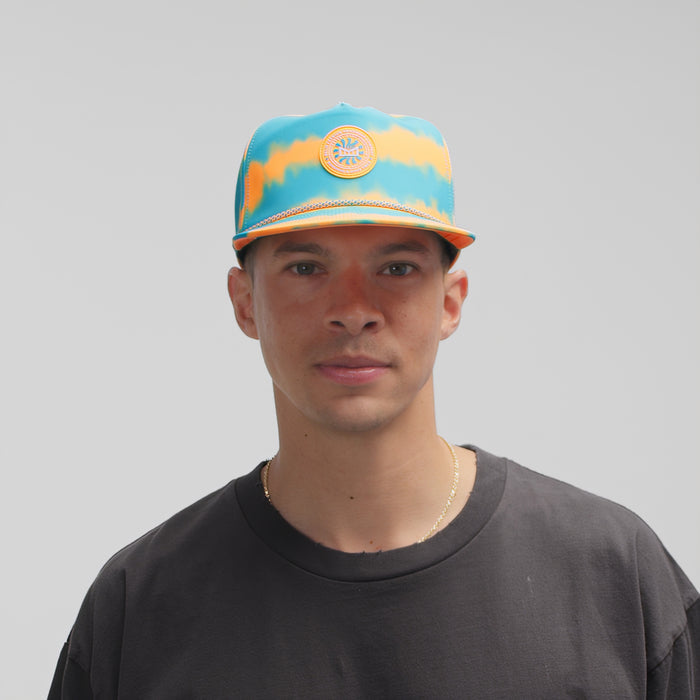 The model-image of melin Split Crushed Fit Coronado Neon Tie Dye Hydro Hat in Turquoise