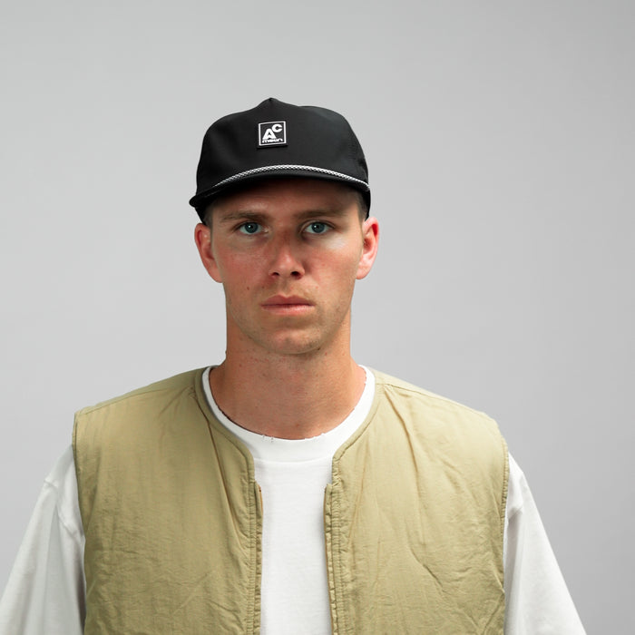 The model-image of the Melin Split Crushed Fit Coronado Packable Hydro hat in Black