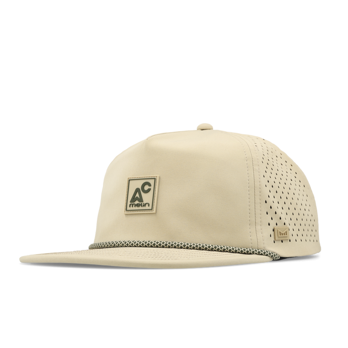 The angled view of the melin Split Crushed Fit Coronado Packable Hydro hat in sand