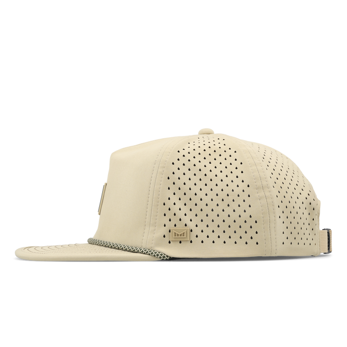 The side view of the melin Split Crushed Fit Coronado Packable Hydro hat in sand