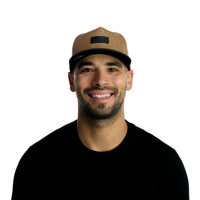 The model-image of the Melin Split Crushed Fit Coronado Scout Thermal hat in Caramel