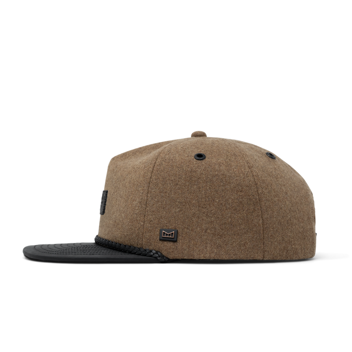 The side view of the melin Coronado Scout Thermal  Split Crushed Fit in Caramel