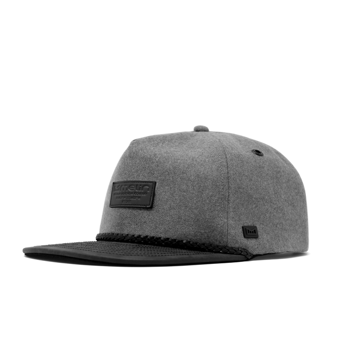 The front, angled view of the melin Coronado Scout Thermal  Split Crushed Fit in Heather Grey / Black