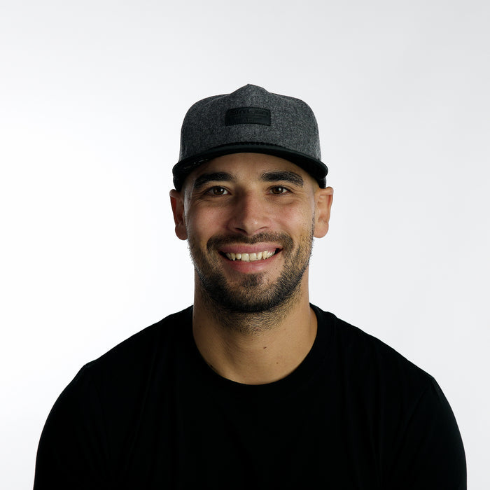 The model-image of the Melin Split Crushed Fit Coronado Scout Thermal hat in Heather Grey / Black