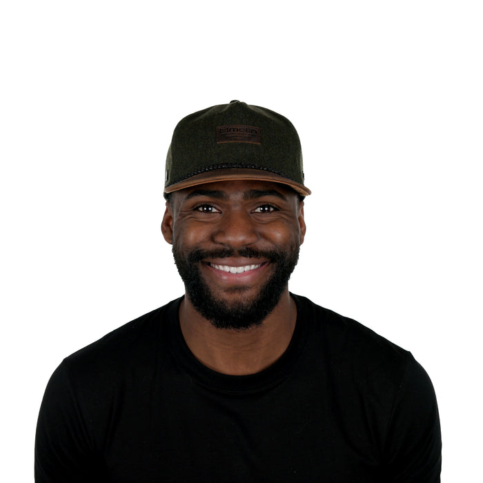 The model-image of the Melin Split Crushed Fit Coronado Scout Thermal hat in Spruce