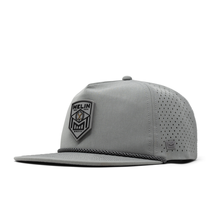 The front, angled view of the melin Coronado Shield Hydro  Split Crushed Fit in  Heather Grey