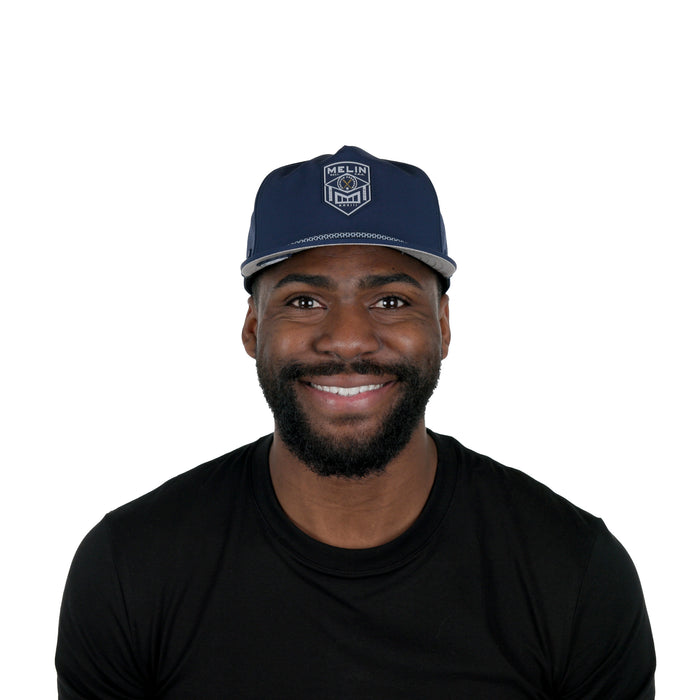 The model-image of the Melin Split Crushed Fit Coronado Shield Hydro hat in Navy