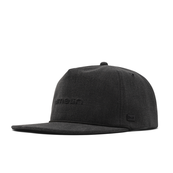 The front, angled view of the melin Coronado Thermal  Split Crushed Fit in Black Denim