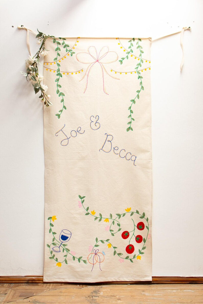 Custom hand-painted wedding banner detail