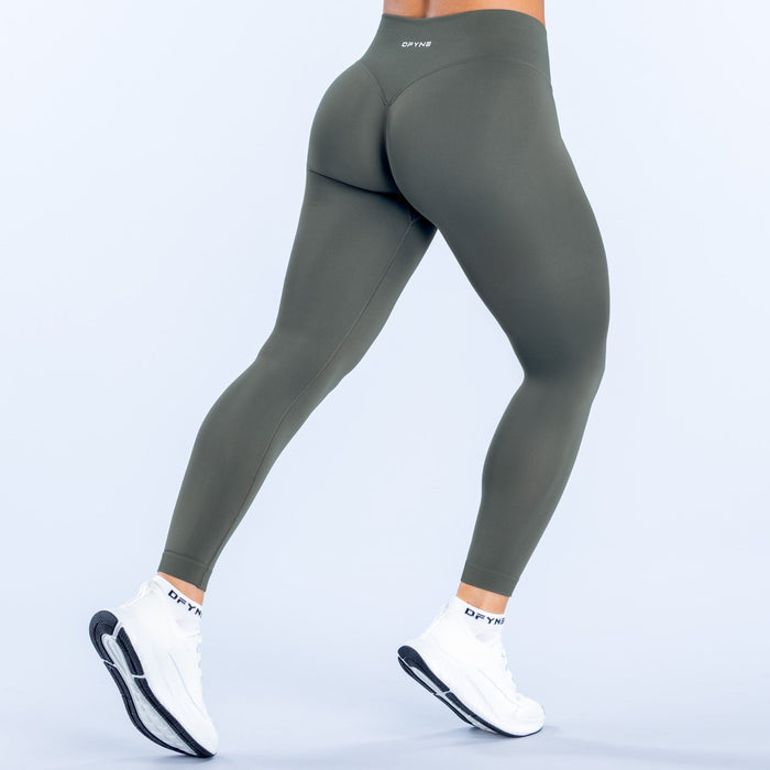 Olive green back view leggings with contoured seams and ankle-length hem