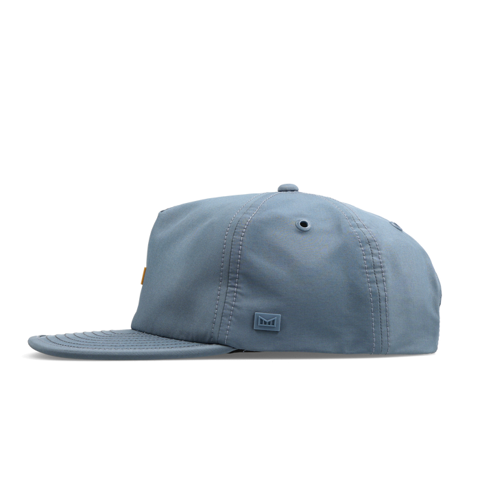 The side view of the melin Split Crushed Fit Eagle Hydro hat in blue stone / gum