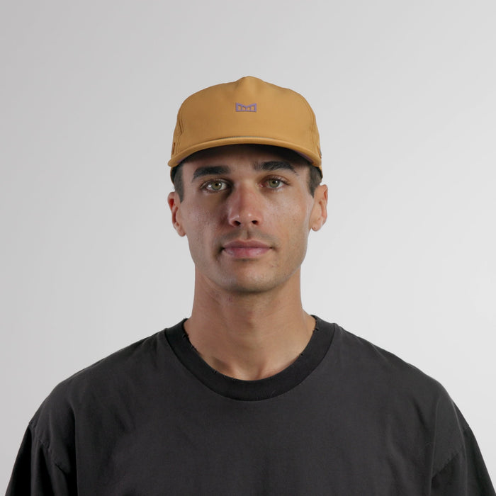 The model-image of the melin Split Crushed Fit Eagle Hydro hat in transit