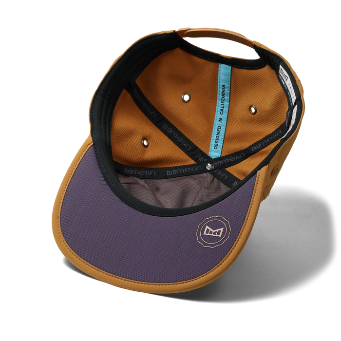 The inside view of the melin Split Crushed Fit Eagle Hydro hat in transit