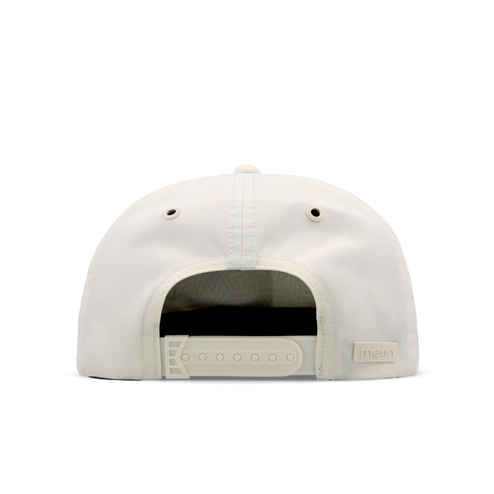 The back view of the melin Split Crushed Fit Eagle Icon Hydro hat in egret