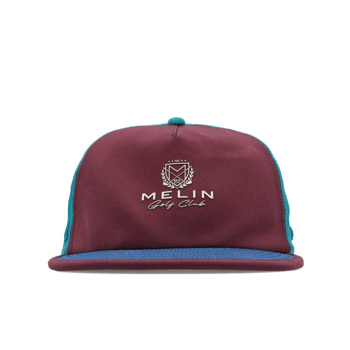 The front view of the melin Split Crushed Fit Eagle Links Clubhouse Hydro hat in grandeur