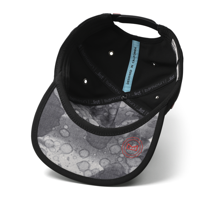 The inside view of the melin Split Crushed Fit Eagle Mayhem Hydro hat in black