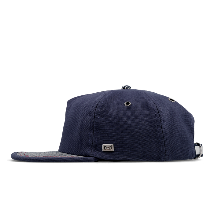 The side view of the melin Split Crushed Fit Eagle Mill Union hat in hickory denim