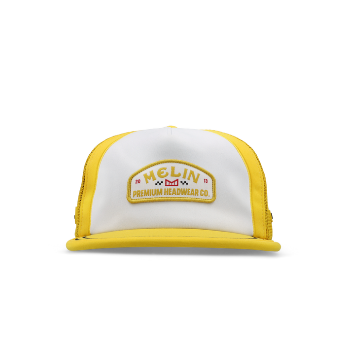 The frontal view of the melin Split Crushed Fit Eagle MPH Pit Crew Hydro hat in golden