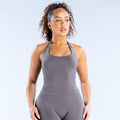 Dark gray halter sports top with racerback and curved hem seams