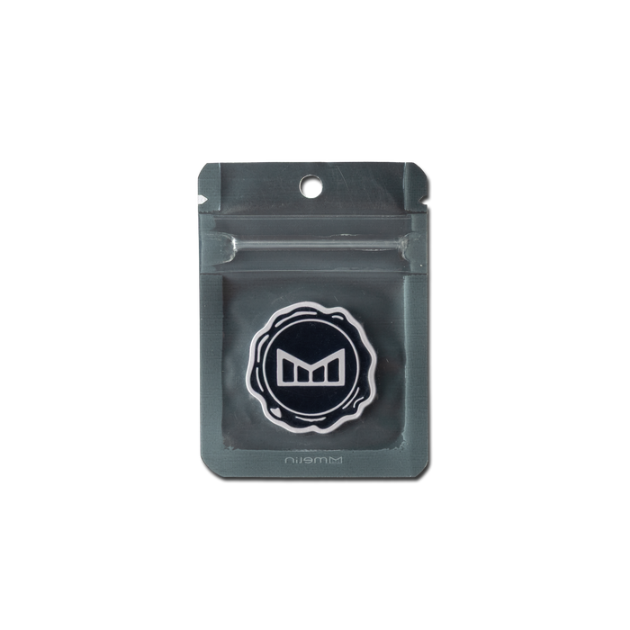 melin Icon Ball Marker in Black/White, shown in its packaging