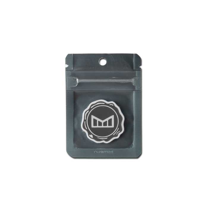 melin Icon Ball Marker in Grey/White, shown in its packaging