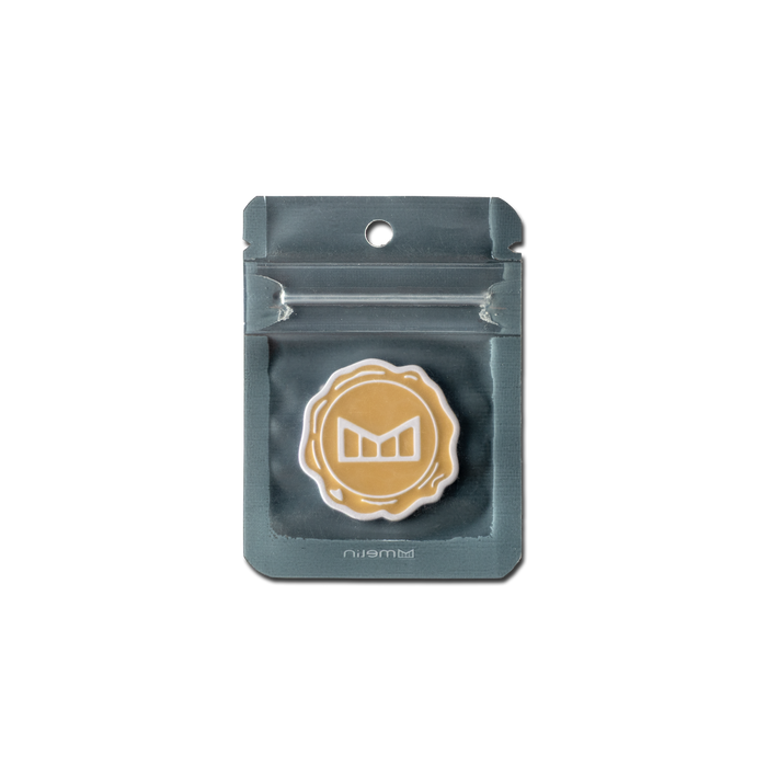 melin Icon Ball Marker in Khaki/White, shown in its packaging