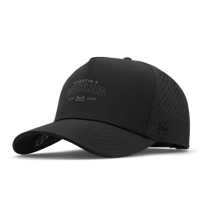 Black baseball cap with "Austin Gamblers" embroidered on front panel and perforated mesh panels on sides and back.