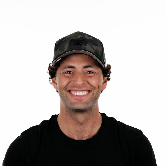 The model-image of the Melin Split Fit Odyssey Brick Hydro hat in Olive Camo Midnight