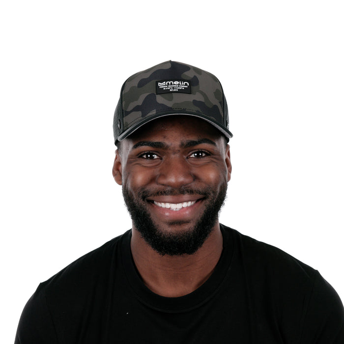 The model-image of the Melin Split Fit Odyssey Brick Hydro hat in Olive Camo