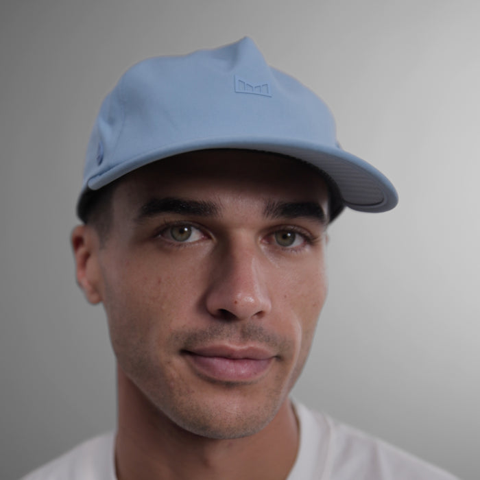 The model-image view of the melin Split Fit Odysea Hydro VO2 hat in Allure