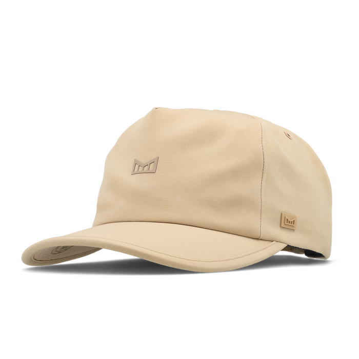 The angled view of the melin Odysea Hydro VO2 hat in Incense