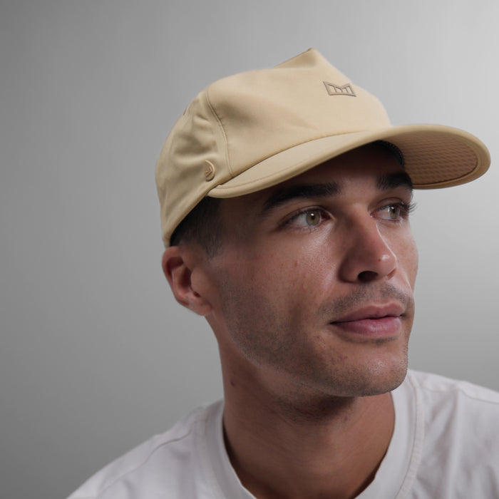 The model-image view of the melin Split Fit Odysea Hydro VO2 hat in Incense