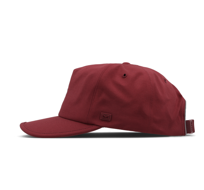 The side view of the melin Odysea Hydro VO2 hat in Tawny Port