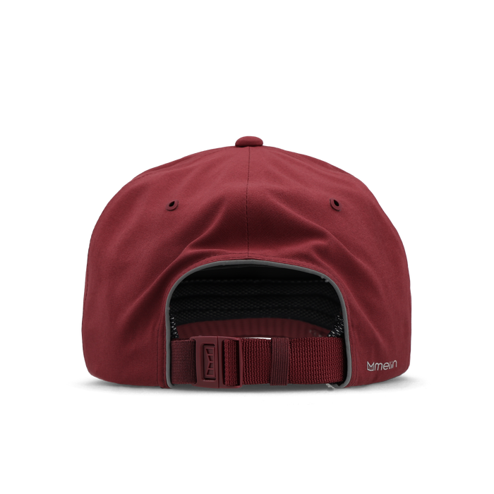 The back view of the melin Odysea Hydro VO2 hat in Tawny Port