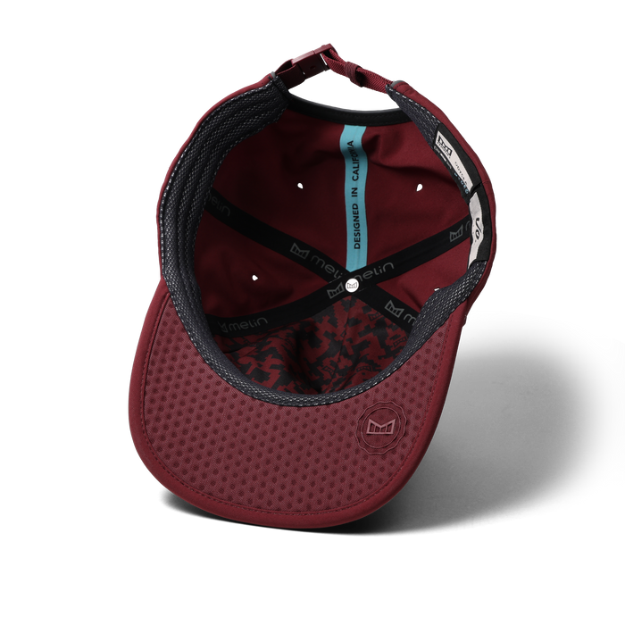 The inside view of the melin Odysea Hydro VO2 hat in Tawny Port