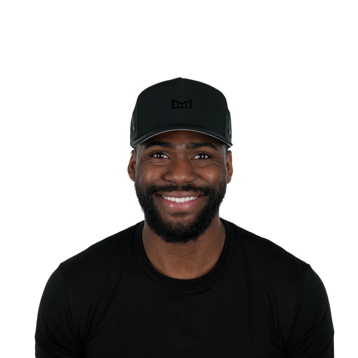 The model-image of melin's Odysea Hydrolite snapback hat in Black